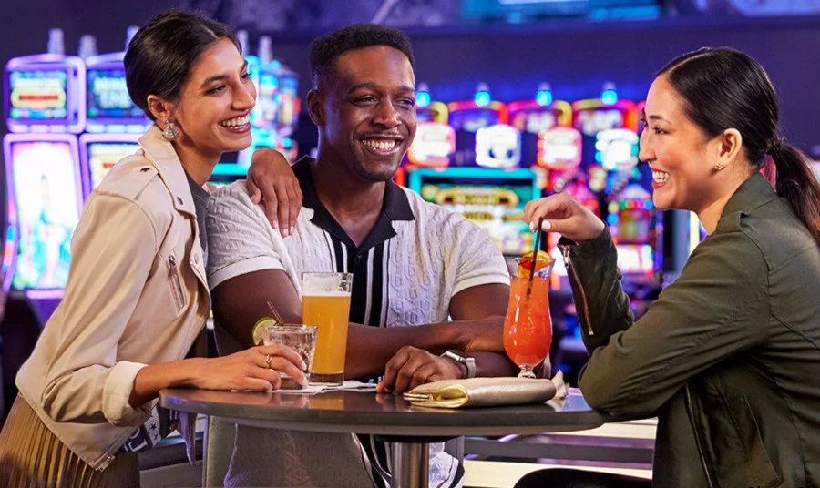 Casino floor bank of slot machines with overhead progressive jackpot meters