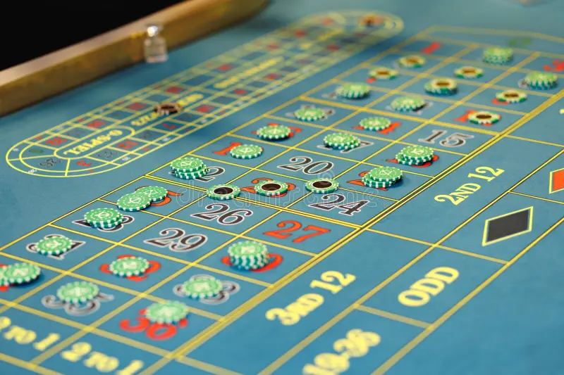 Overhead view of a roulette betting table felt showing inside and outside chip placements